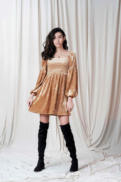 Crushed velvet dress with decorative smocking