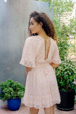 Linear lace wrap-front dress