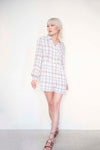 Plaid button-front long sleeve romper